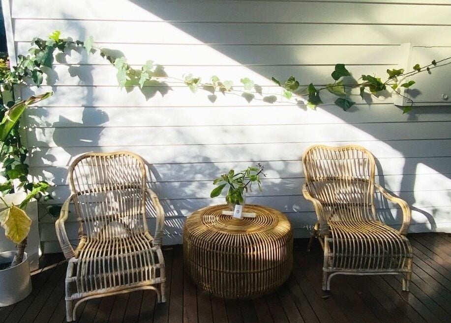 Cozy outdoor seating at Elements Bodyworks in Doubleview, Western Australia, AU under natural sunshine.