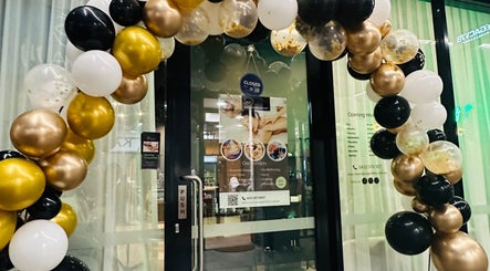 Elegant balloon arch at Mel's Massage & Reflexology - Mount Lawley, Western Australia, AU entrance.