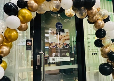 Elegant balloon arch welcomes you to Mel's Massage & Reflexology - Mount Lawley, Western Australia, AU.