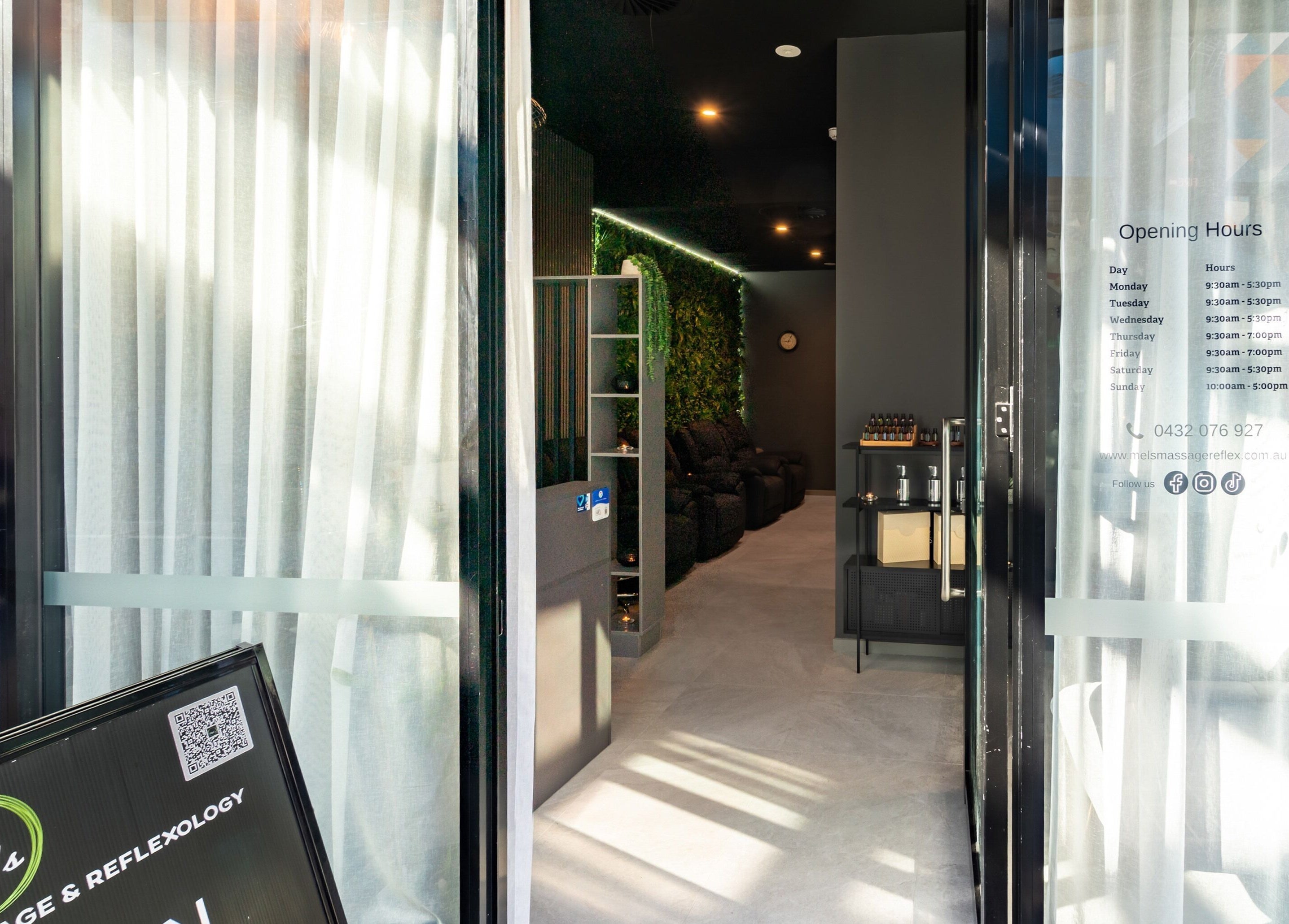 Entrance at Mel's Massage & Reflexology - Mount Lawley, showcasing elegant curtains and inviting decor.