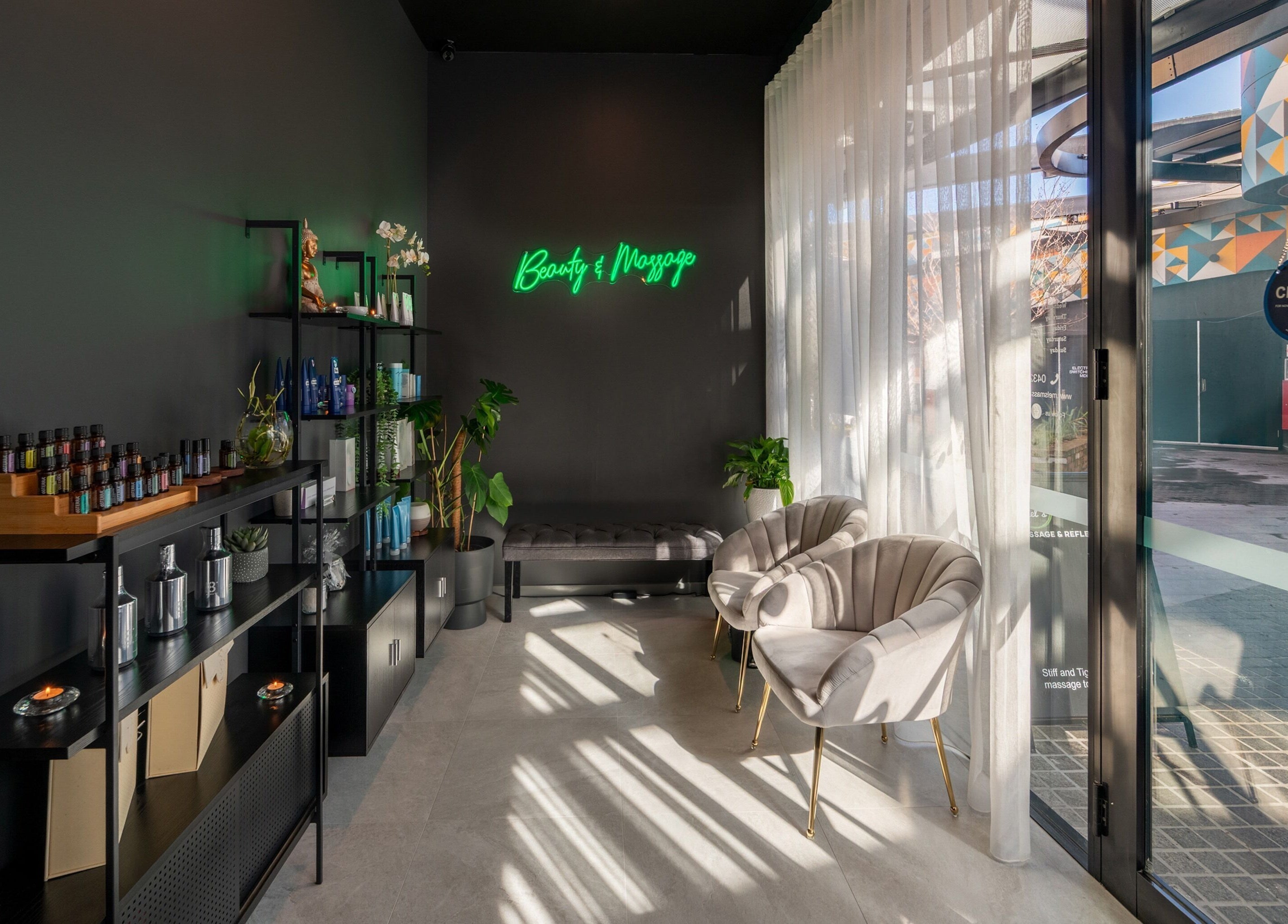 Relaxing lounge at Mel's Massage & Reflexology - Mount Lawley, Western Australia, AU with chairs and decor.