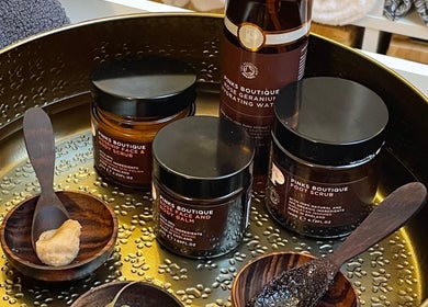 Luxurious skincare products on a gold tray at Sarah Emily Holistics, Helpston, England, GB.
