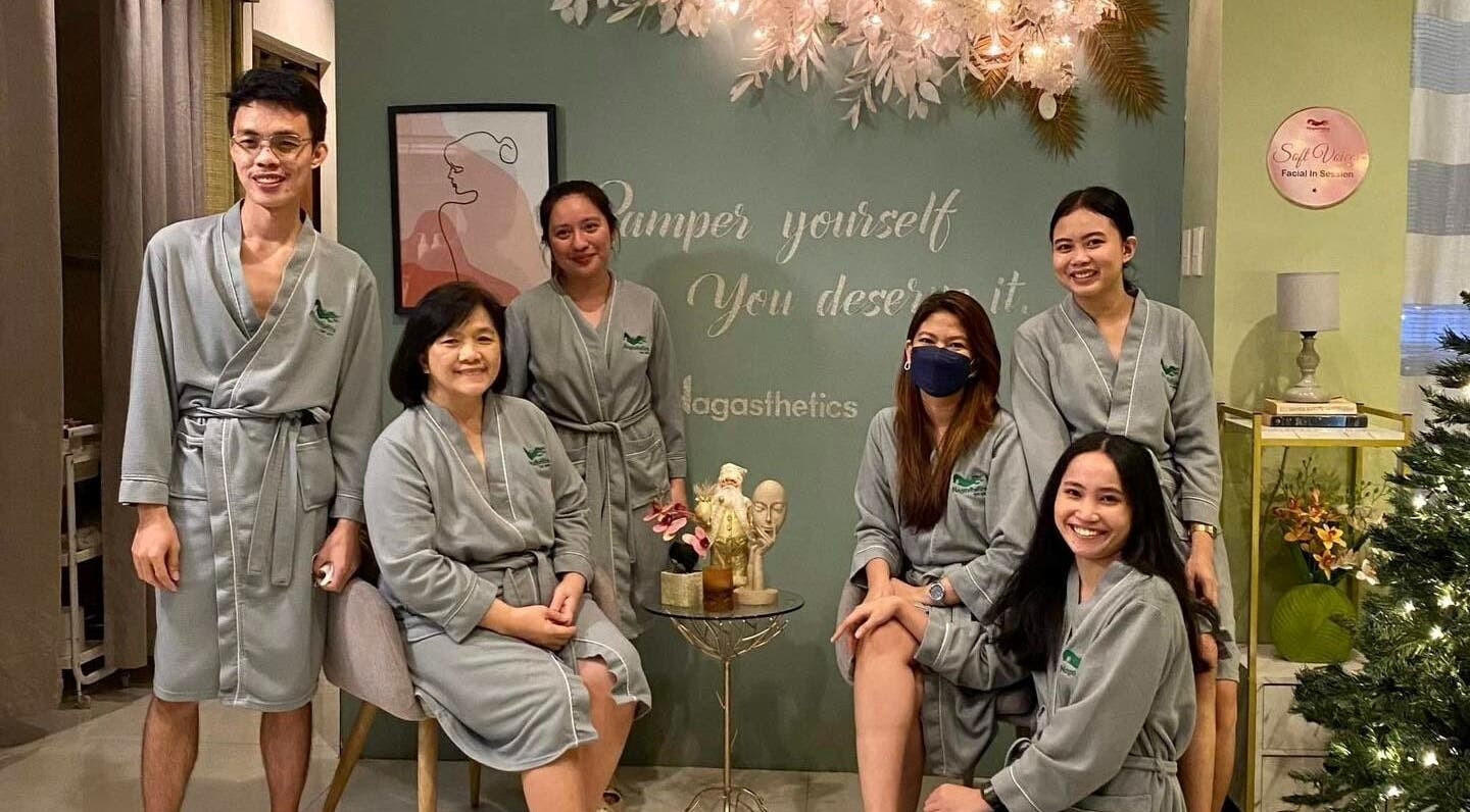 Happy team in robes at Nagasthetics Day Spa, Naga, Bicol, PH, showcasing a serene spa atmosphere.