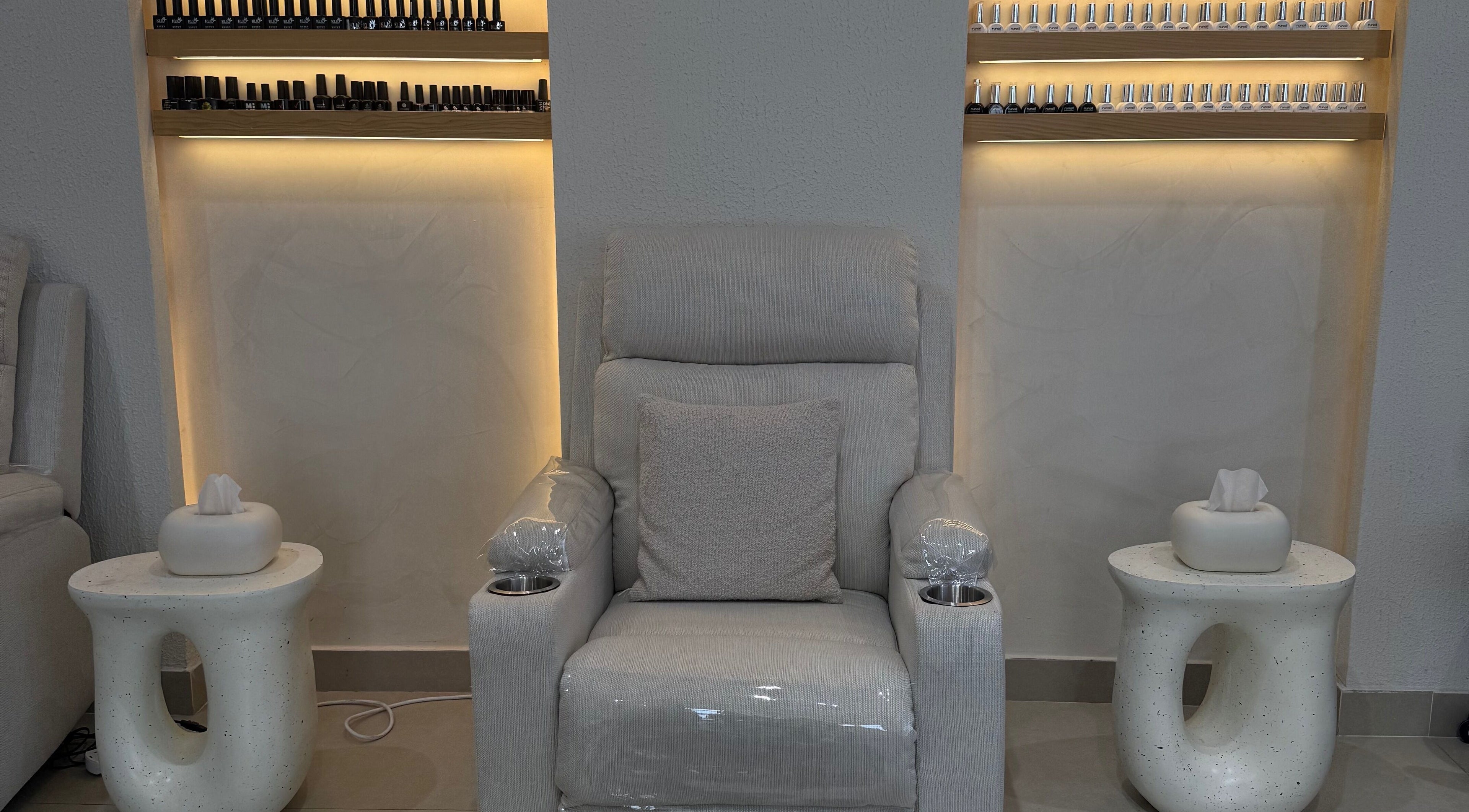 Comfortable nail chair setup at Xtend Beauty Studio, Dubai, AE, offering a relaxing experience.