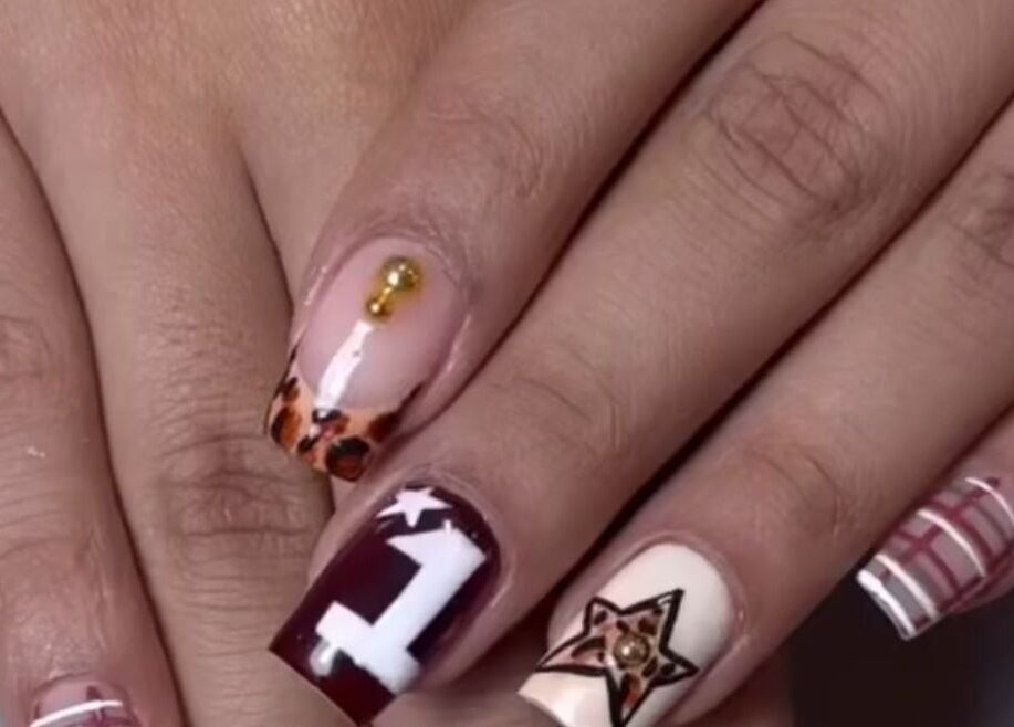 Intricately designed nails with leopard print and patterns at Xtend Beauty Studio, Dubai, AE.
