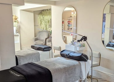 Luxurious treatment room at Superfine Cosmetics in Ruthin, Wales, GB featuring elegant decor and modern amenities.