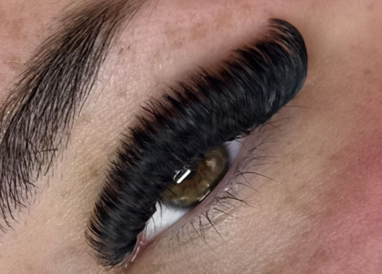 Close-up of expertly applied eyelash extensions at Superfine Cosmetics, Ruthin, Wales, GB.