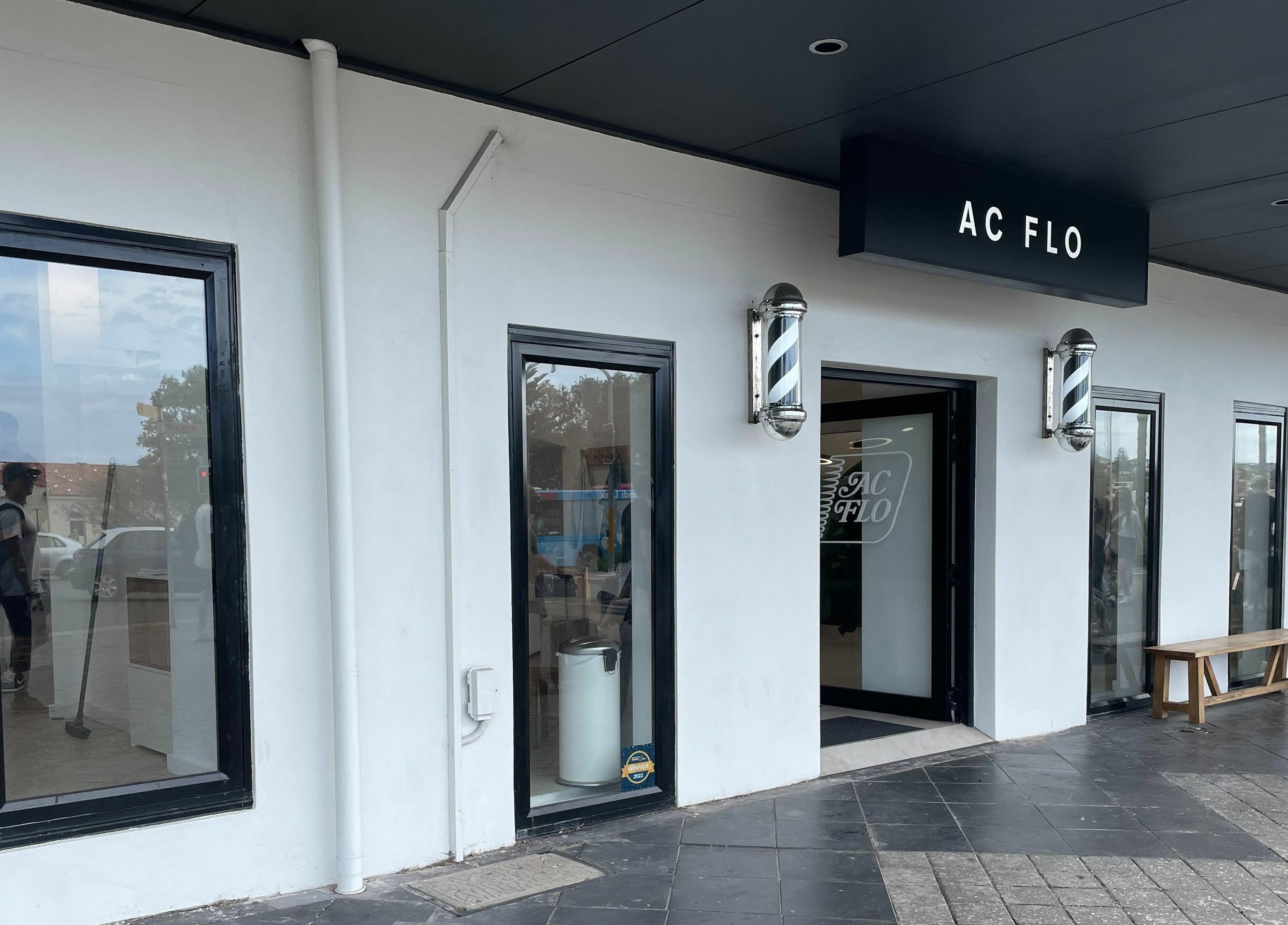 Front entrance of AC FLO at Bondi Beach, New South Wales, AU with modern design and welcoming ambiance.