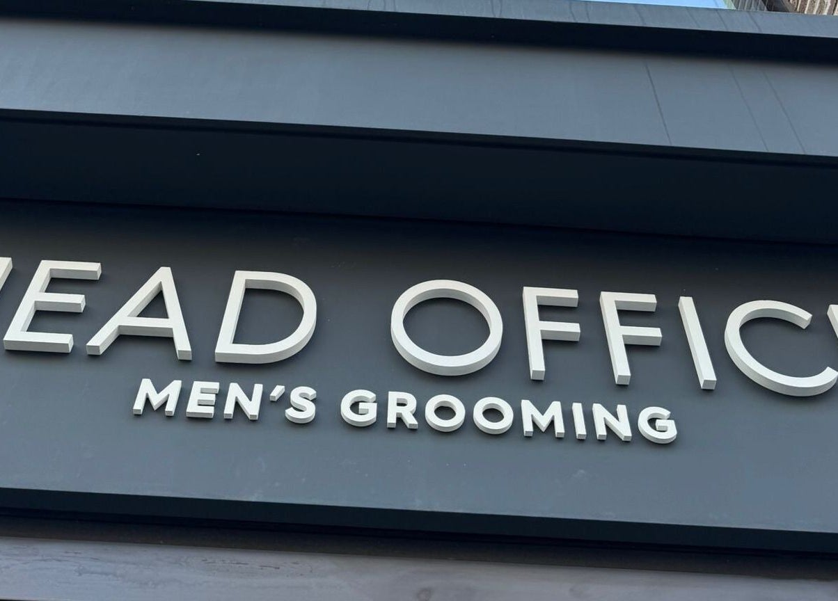 Entrance sign of Head Office Men's Grooming - Waterloo in London, England, GB.