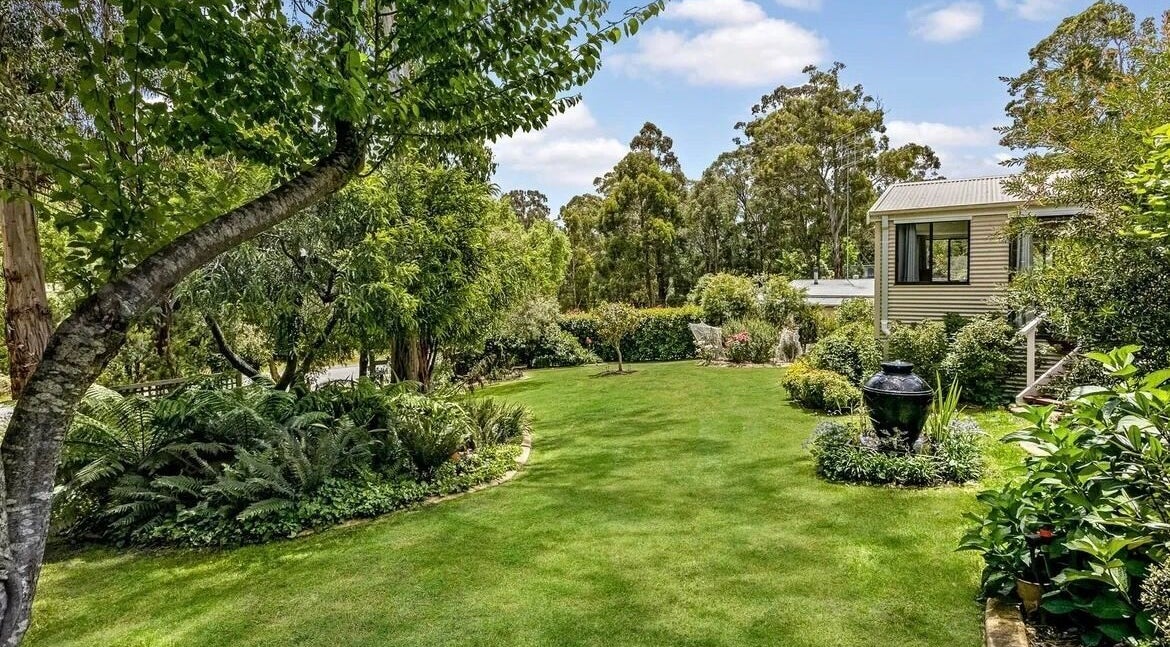 Lush garden view at Skin Solace, Blackwood, Victoria, AU, offering tranquility and natural beauty.