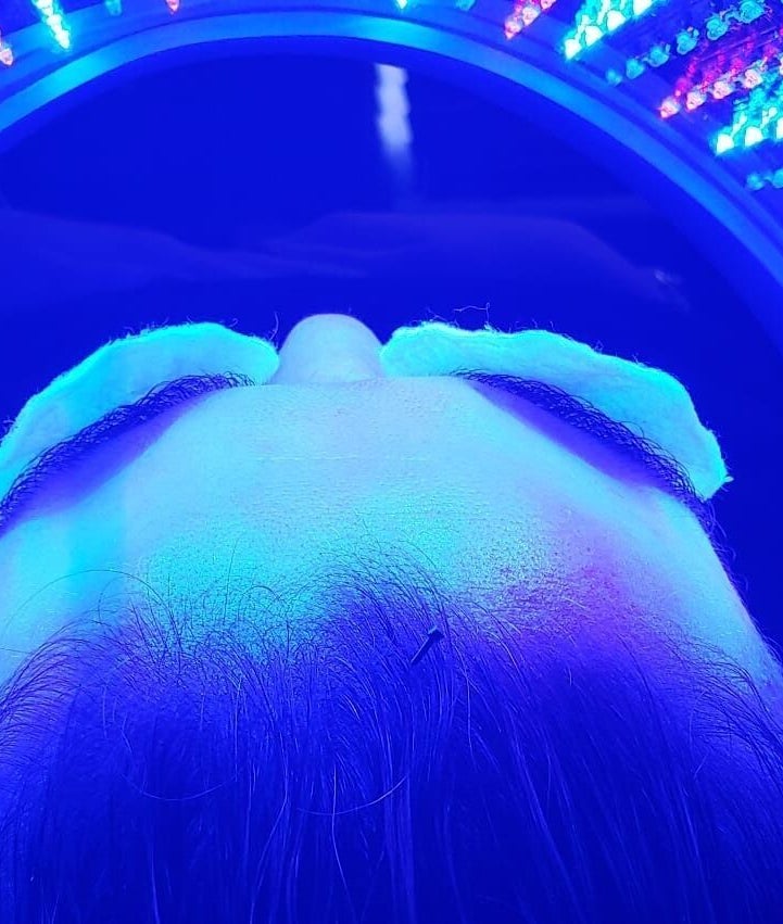 Blue light facial therapy session at Hammersmith W6 8HS, London, England, GB, enhancing skin health.