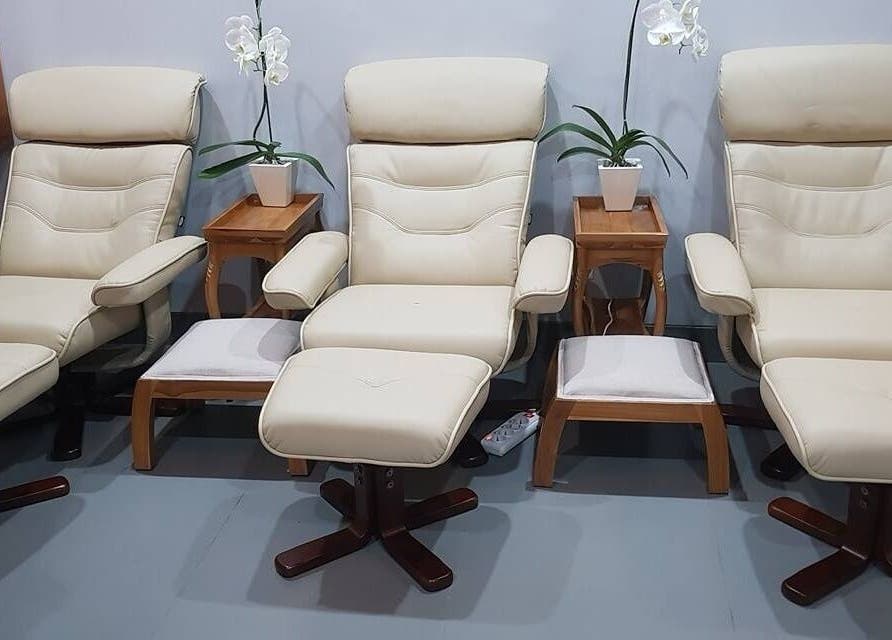 Elegant beige massage chairs at Peni Weni, Bali, Bali, ID, offering a tranquil spa experience.