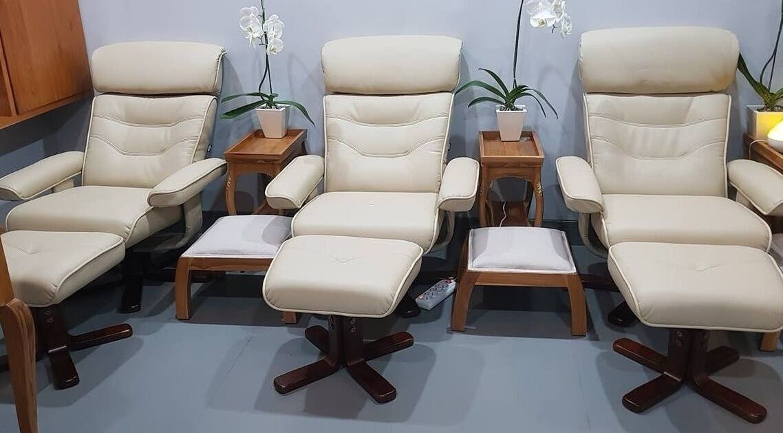 Elegant beige massage chairs at Peni Weni, Bali, Bali, ID, offering a tranquil spa experience.