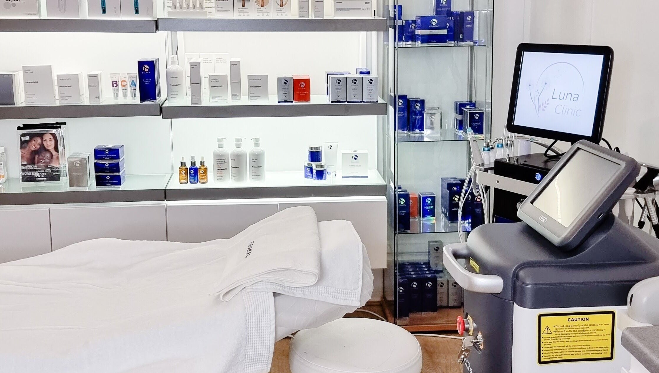 Dermacy Clinic treatment room with skincare products in Doncaster, England, GB.