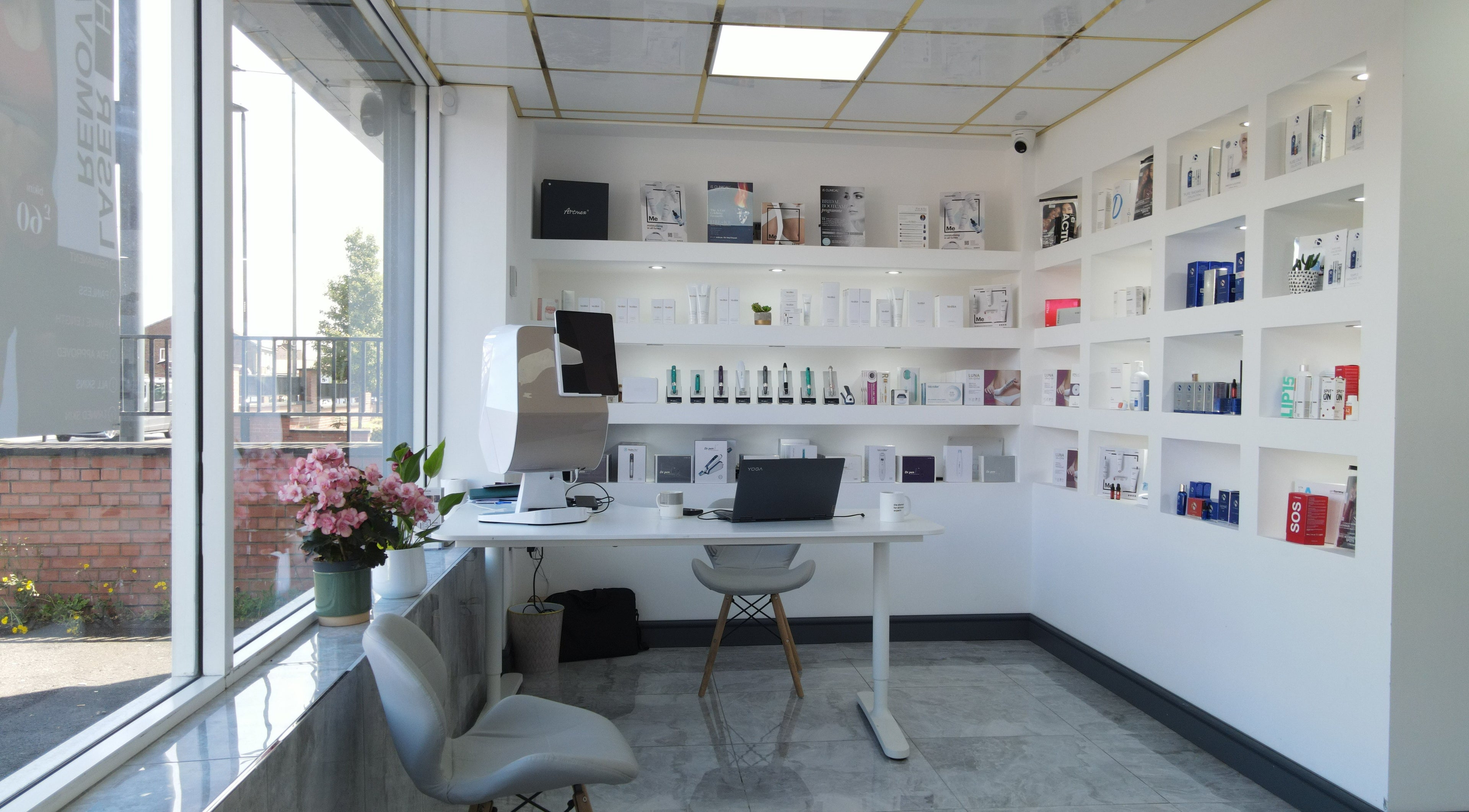 Dermacy Clinic in Doncaster, England, GB features a bright, modern interior with a variety of wellness products on display.