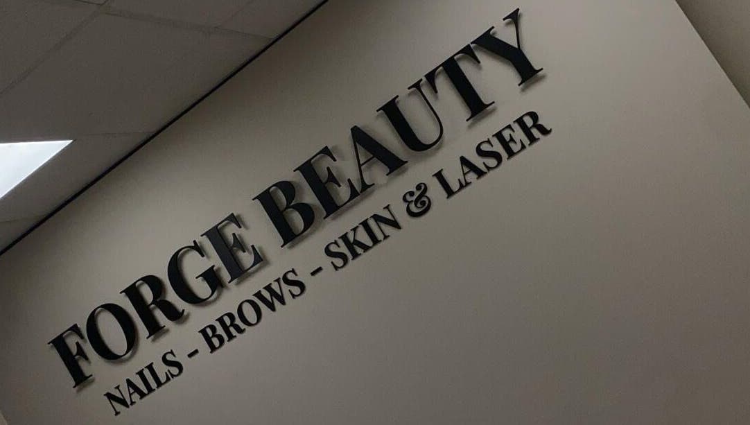 Forge Beauty Coolock wall sign showcasing nails, brows, skin, and laser services, Dublin, County Dublin, IE.