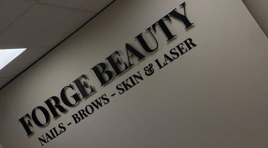 Forge Beauty Coolock wall sign showcasing nails, brows, skin, and laser services, Dublin, County Dublin, IE.