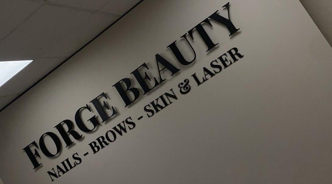 Forge Beauty Coolock wall sign showcasing nails, brows, skin, and laser services, Dublin, County Dublin, IE.