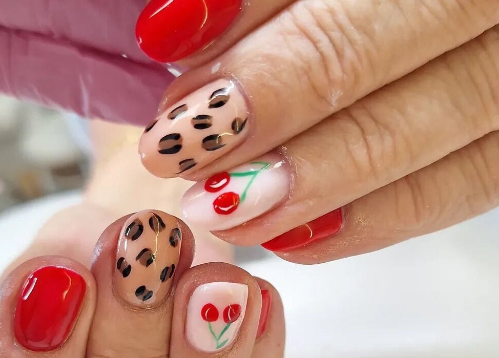 Vibrant nail art with cherries and leopard design at Forge Beauty Coolock, Dublin, County Dublin, IE.