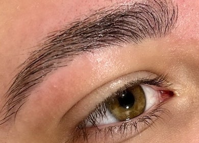 Close-up of a beautifully groomed eyebrow at Fliss Beauty, Clitheroe, England, GB.