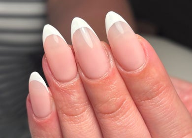 Elegant French manicure at Fliss Beauty, Clitheroe, England, GB, showcasing perfect white tips.