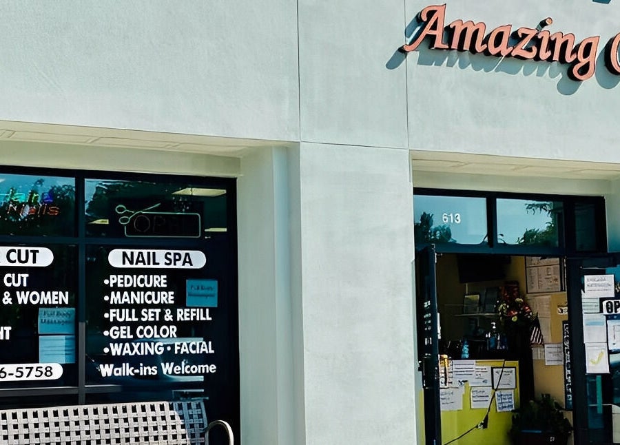Entrance of Amazing Cuts in Sunnyvale, California, US, showcasing salon services and welcoming decor.