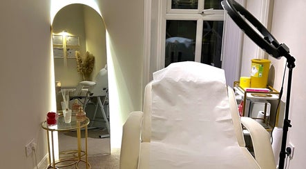 Luxurious treatment room at Face by Nicole, Rochdale, England, GB featuring a well-lit mirror and elegant decor.