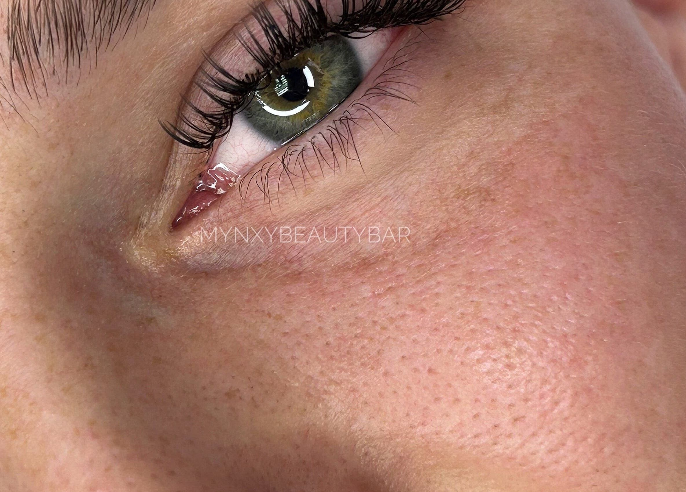 Close-up of eye showcasing elegant lashes at Lashes by Mynxy Beauty Bar, Sandton, Gauteng, ZA.