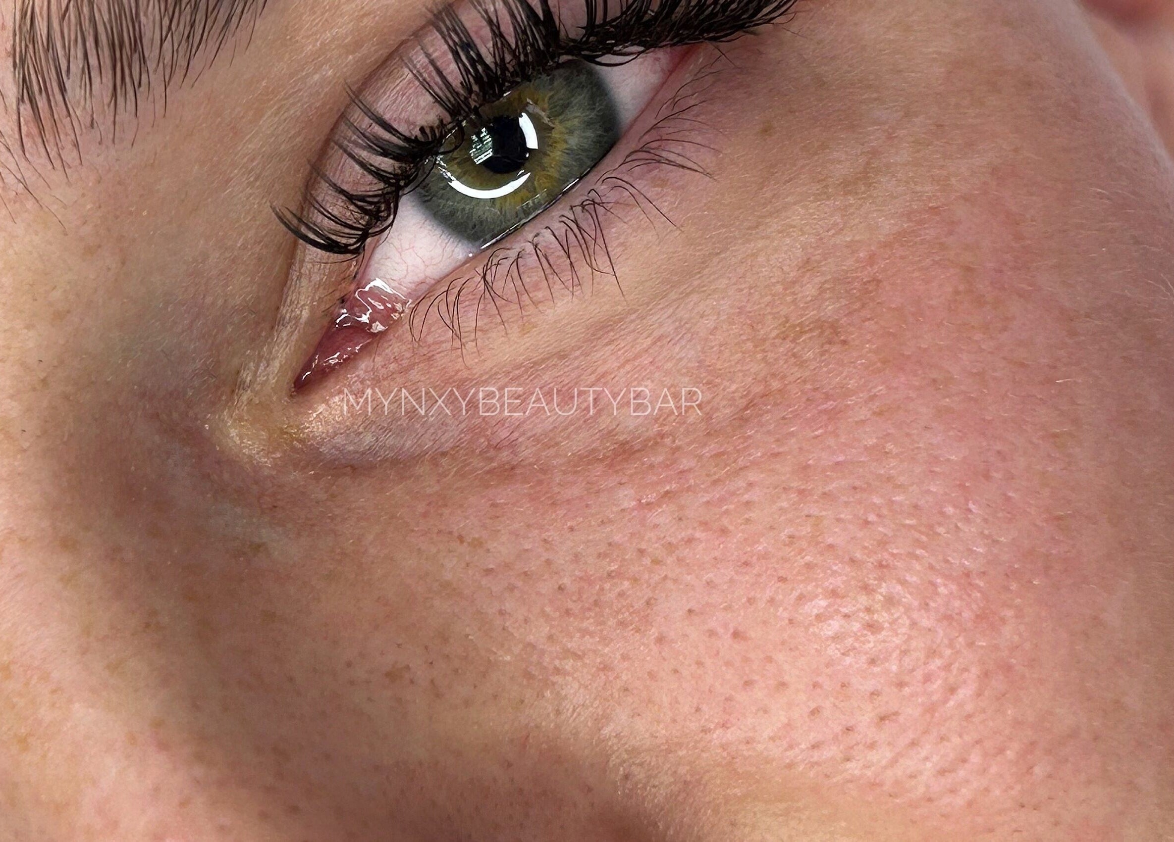 Close-up of eye showcasing elegant lashes at Lashes by Mynxy Beauty Bar, Sandton, Gauteng, ZA.