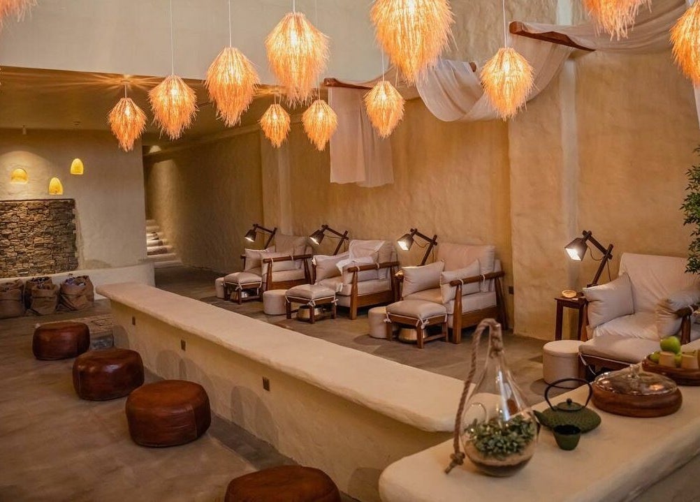 Cozy lounge area at Verve Spa Alrabi, Riyadh, Riyadh Province, SA, featuring plush seating and warm lighting.
