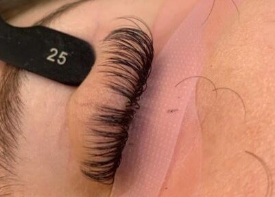 Close-up of lash extensions at Lashedbycharl, Manchester, England, GB, showcasing expert technique.