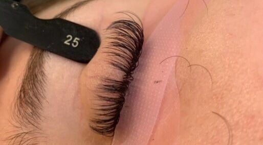 Close-up of lash extensions at Lashedbycharl, Manchester, England, GB, showcasing expert technique.