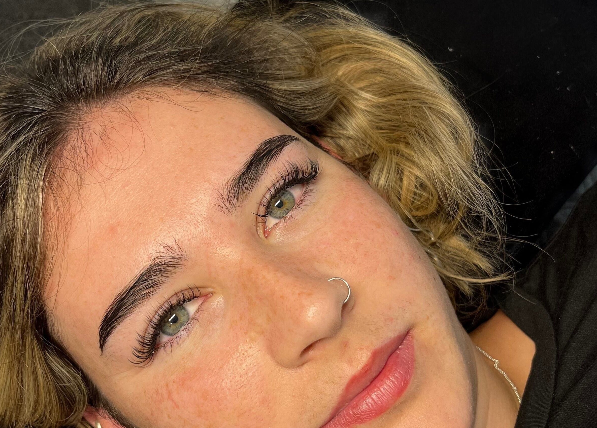 Close-up of lashes done at Lashedbycharl, Manchester, England, GB, showcasing natural beauty and expert styling.