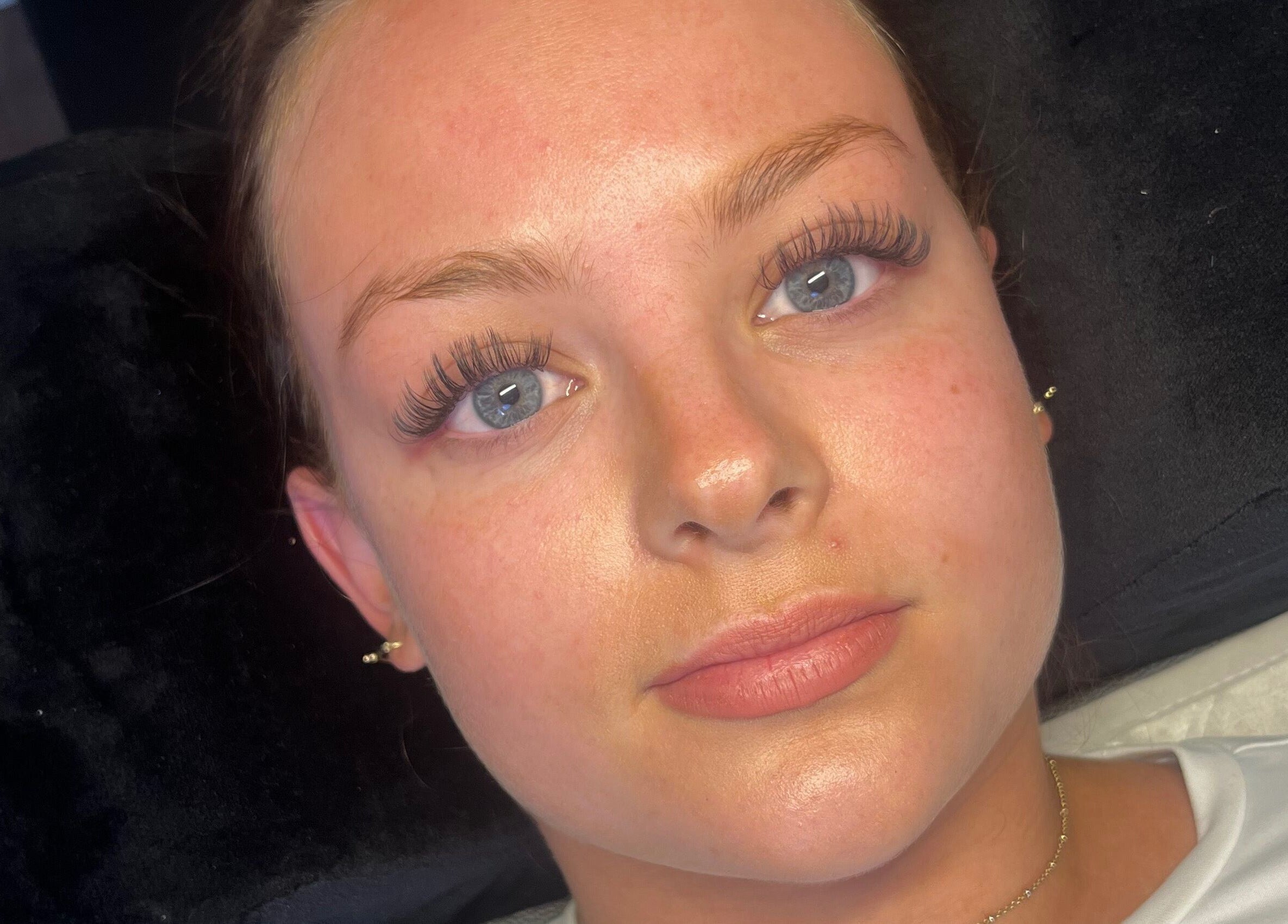 Client with enhanced eyelashes at Lashedbycharl in Manchester, England, GB showcasing superb lash extensions.