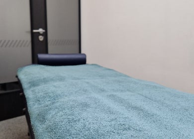 Massage table at Reaction Therapy in Wyndyke Furlong, Abingdon, ideal for appointments from 1st October 2025.