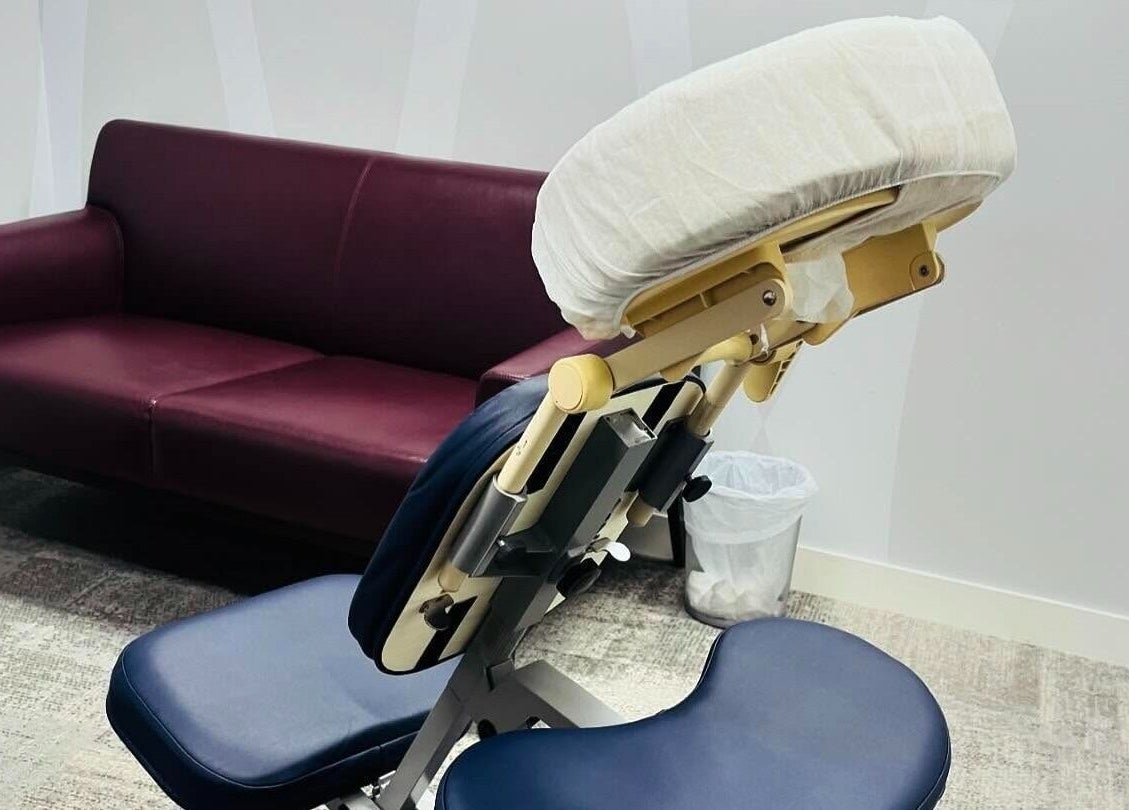 Massage chair in serene room at Elysian Therapies, South Ockendon, GB offering relaxation and wellness.