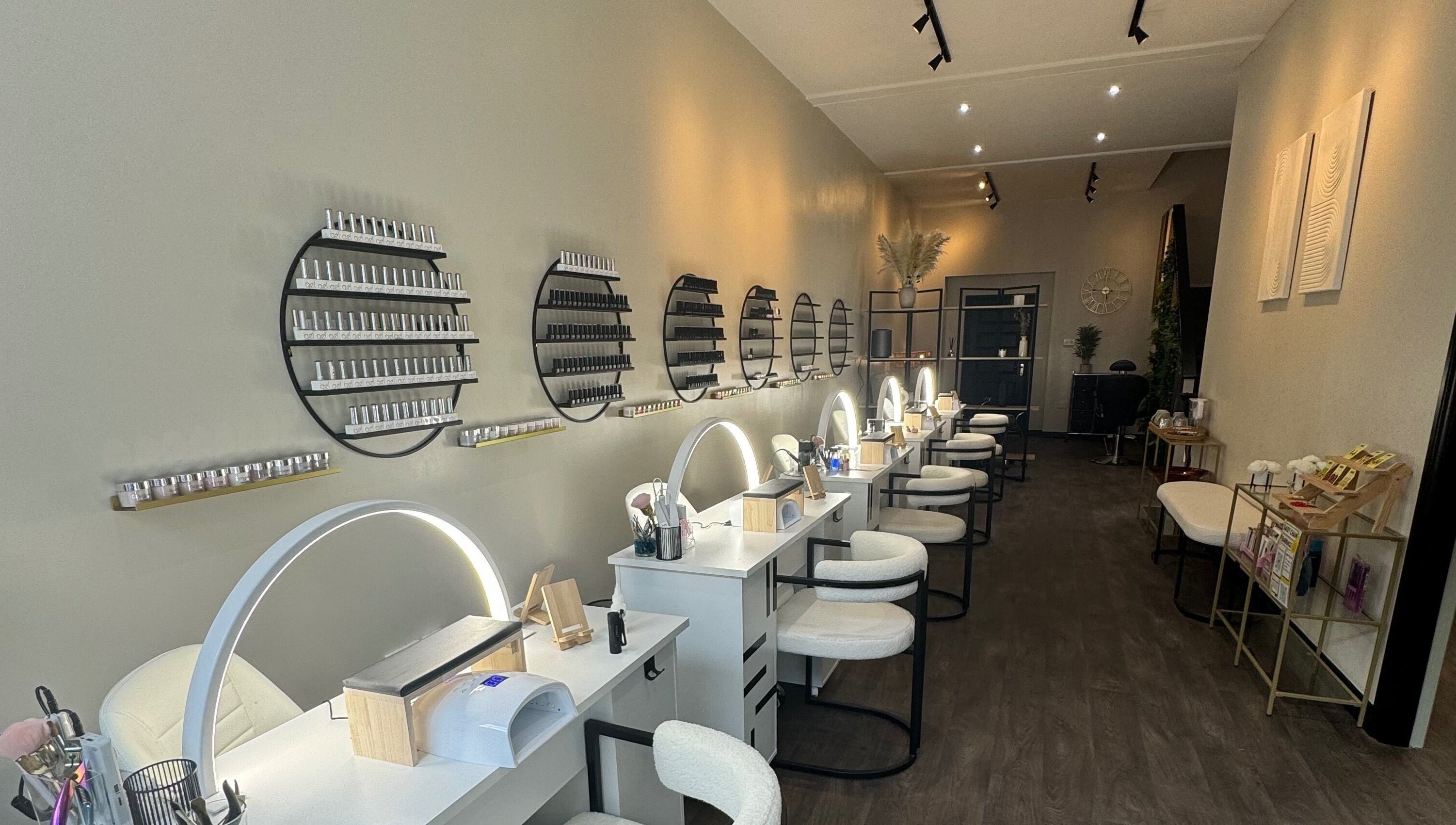 Modern nail salon at Bliss Beauty Bar in Ramsey with chic decor and state-of-the-art equipment.