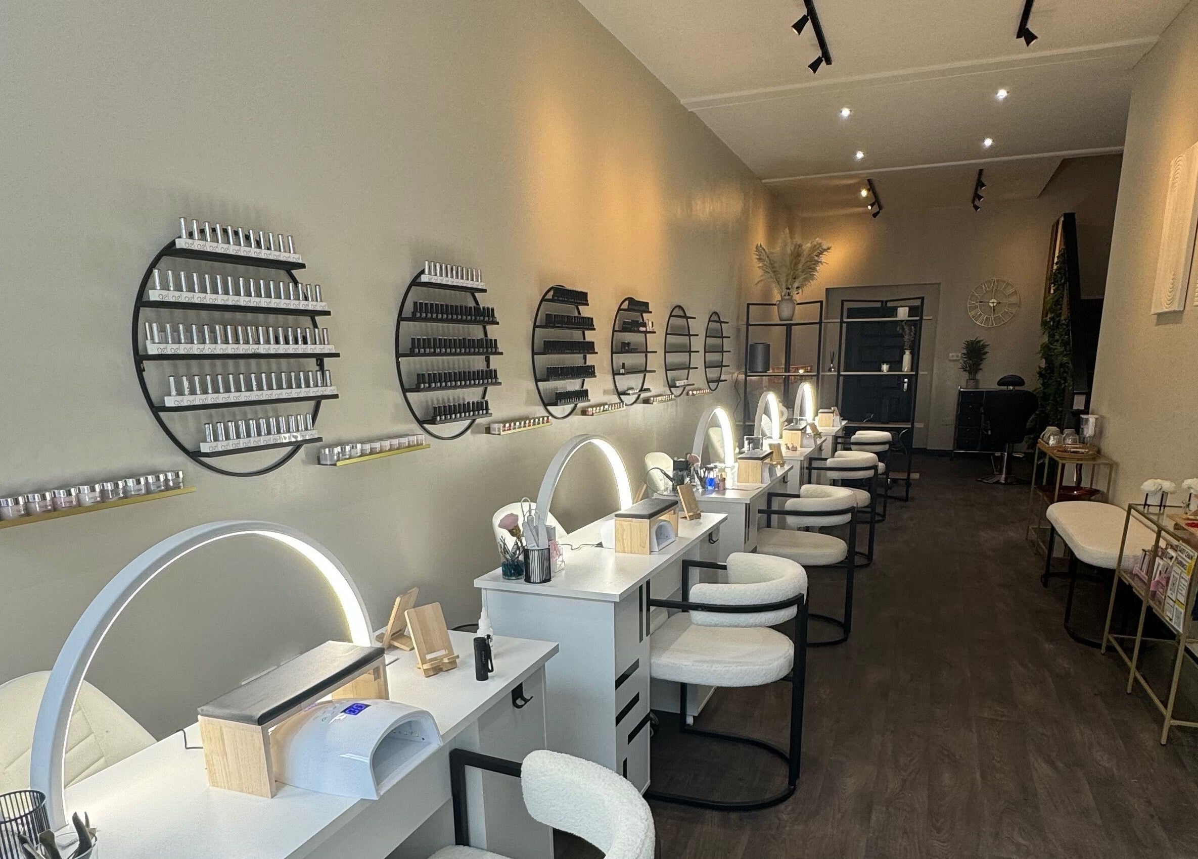 Modern nail salon at Bliss Beauty Bar in Ramsey with chic decor and state-of-the-art equipment.