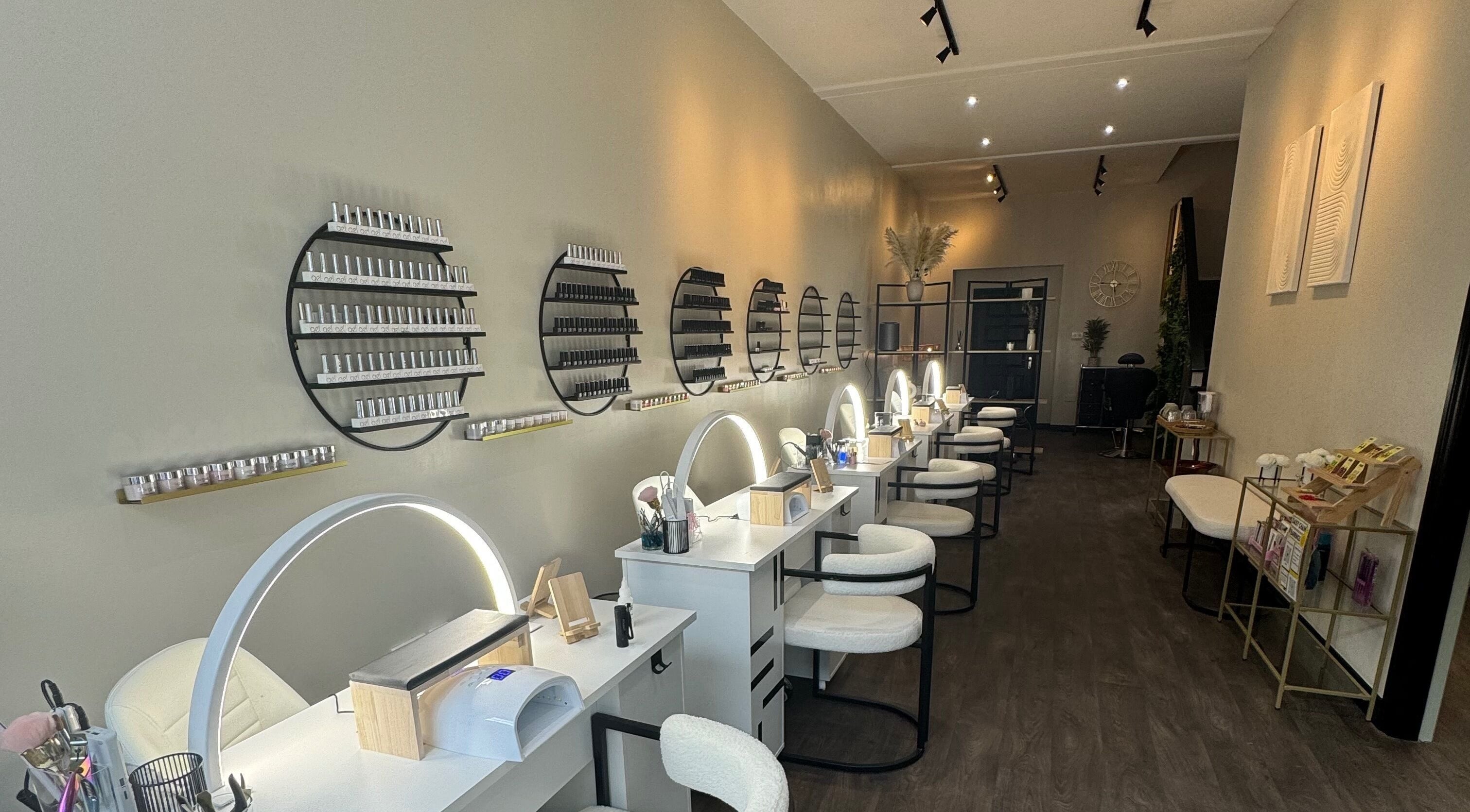 Modern nail salon at Bliss Beauty Bar in Ramsey with chic decor and state-of-the-art equipment.