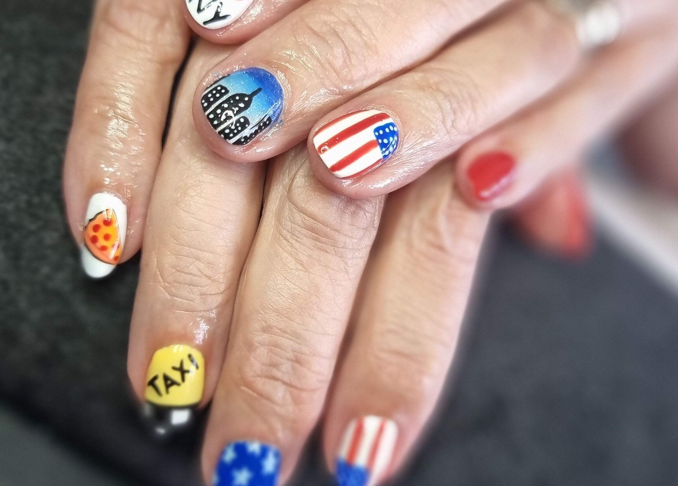 Custom nail art with American flag at Beyond Beauty in Blyth, England, GB.