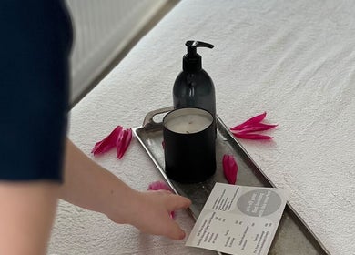 Therapist arranging spa essentials at Elite Massage Kent | Mobile & Treatment Room | Gillingham, England, GB.
