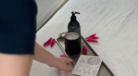 Therapist arranging spa essentials at Elite Massage Kent | Mobile & Treatment Room | Gillingham, England, GB.