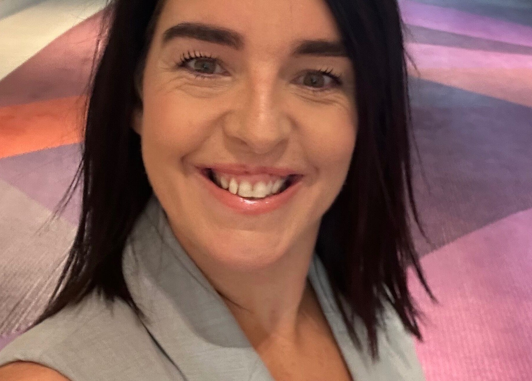 Happy visitor at Sage Holistic Therapies, Alkimos, Western Australia, AU, showcasing vibrant energy.