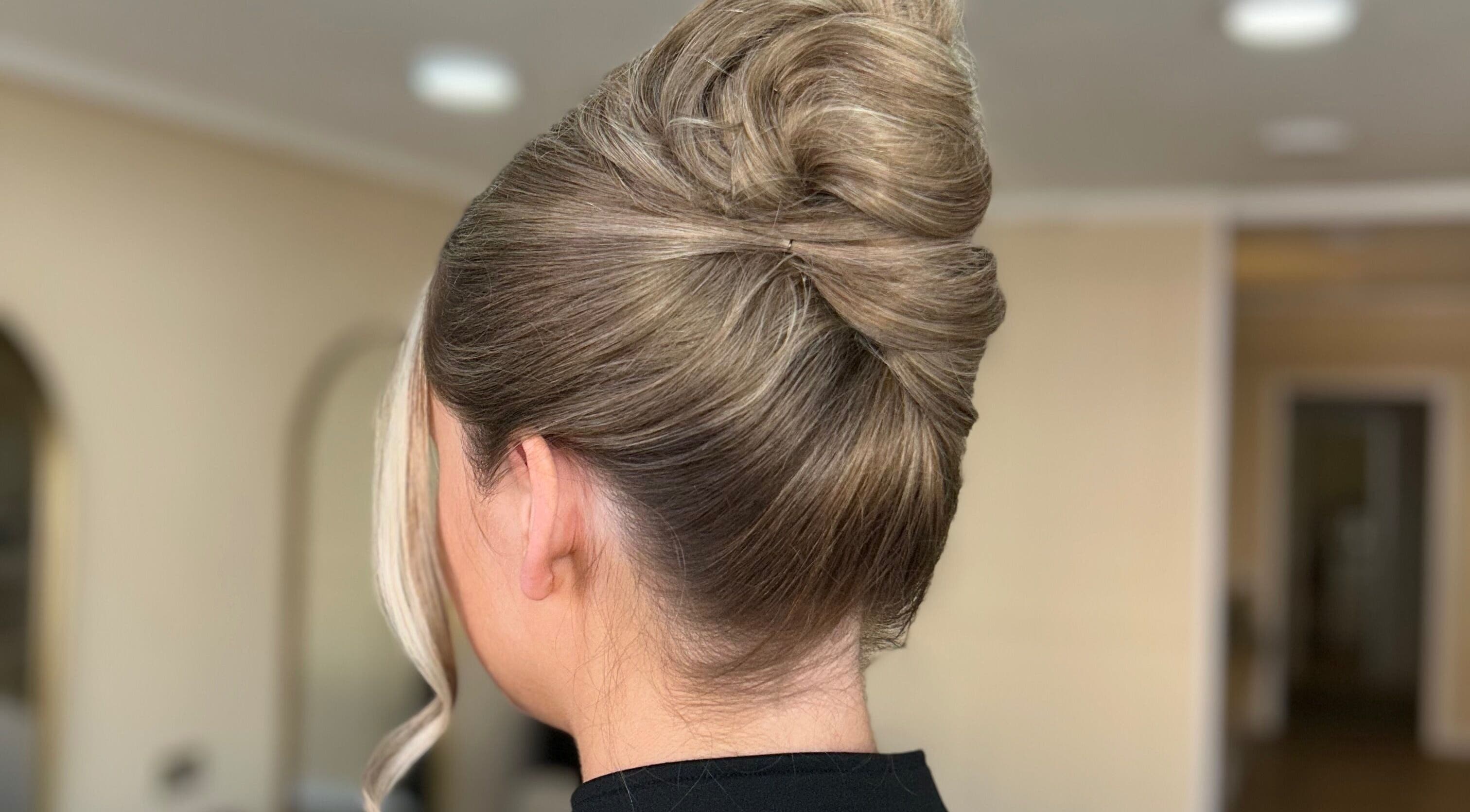 Elegant updo hairstyle at SUL in Prestwich, England, GB. Perfect for special occasions.