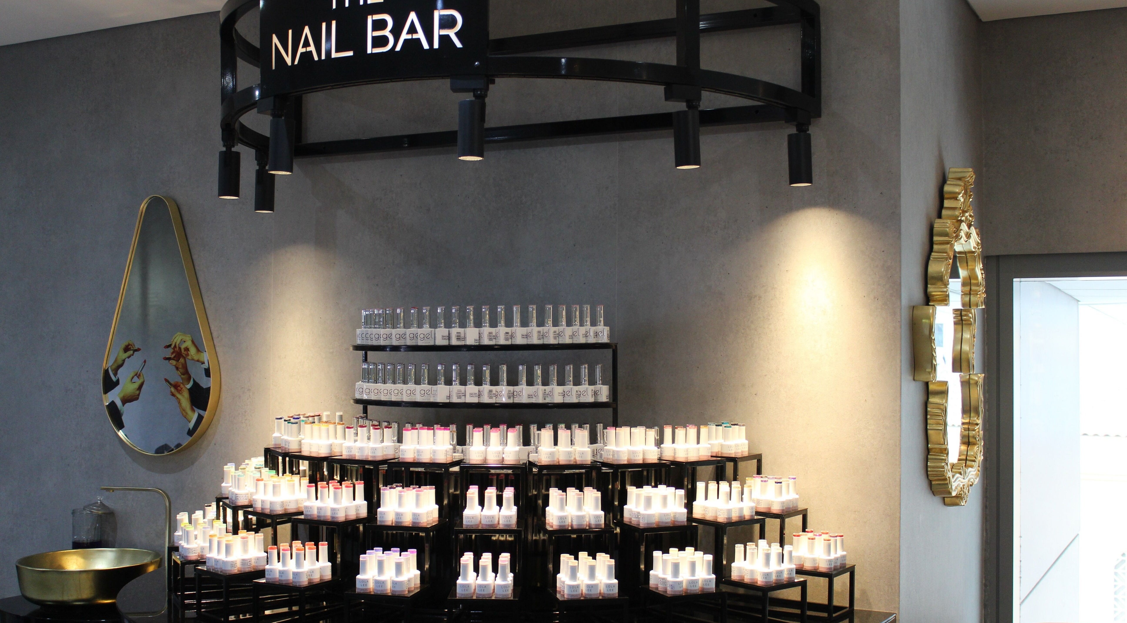 Elegant nail polish display at The Salon Luxe at Five JBR, Dubai, Dubai, AE, showcasing sophisticated decor.