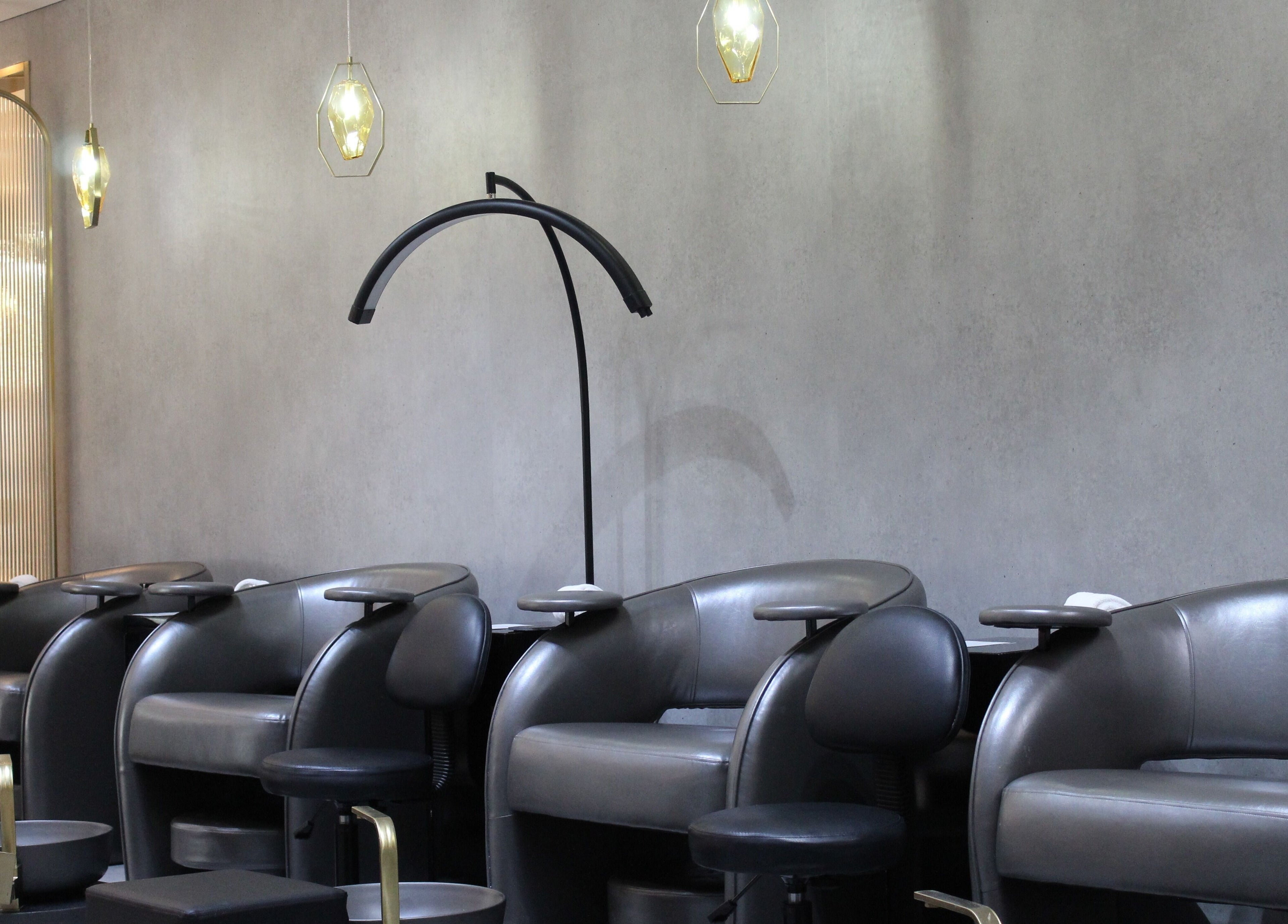 Elegant leather salon chairs at The Salon Luxe at Five JBR, Dubai, Dubai, AE, offering luxury beauty services.
