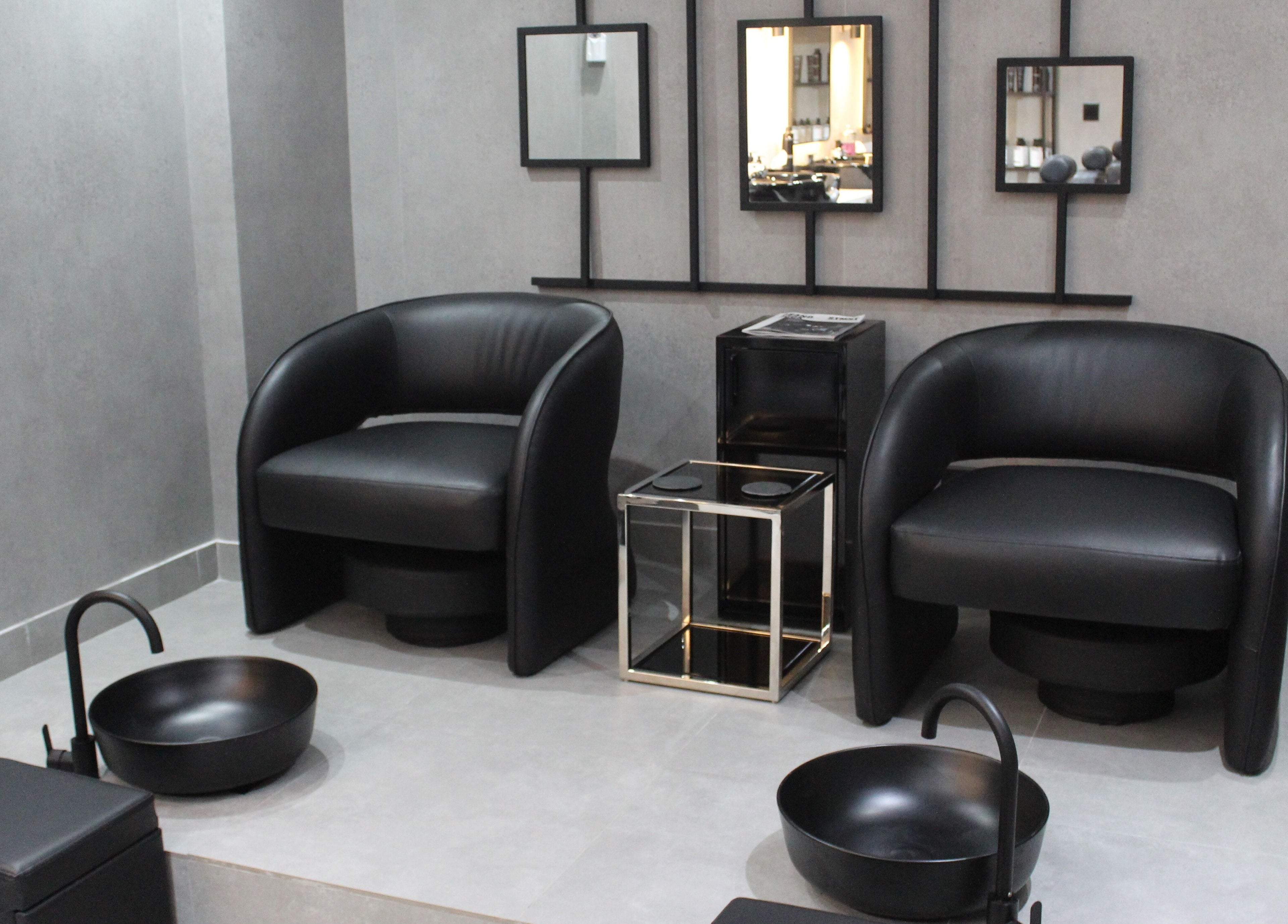 Elegant seating at The Salon Luxe, Dubai, Dubai, AE, offering modern beauty and wellness services.