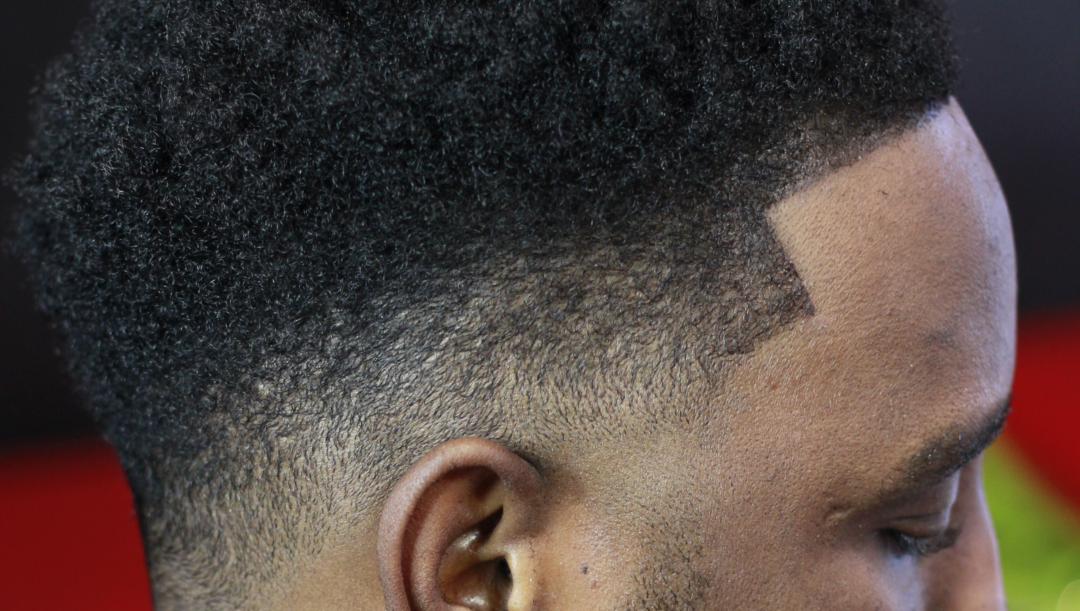 Close-up of a stylish haircut at Rick Blndz in Nassau, New Providence, BS highlighting a clean fade.