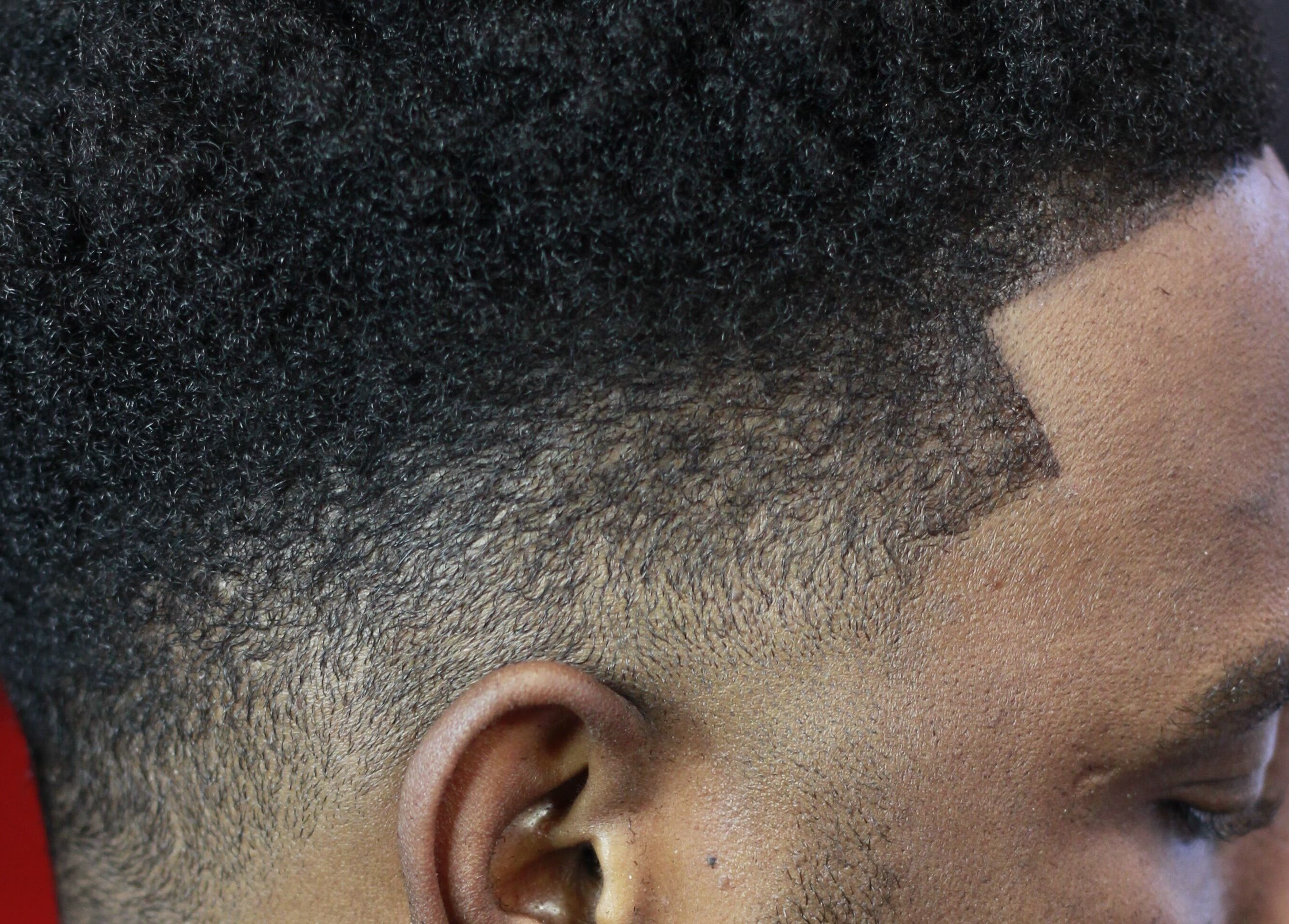 Close-up of a stylish haircut at Rick Blndz in Nassau, New Providence, BS highlighting a clean fade.