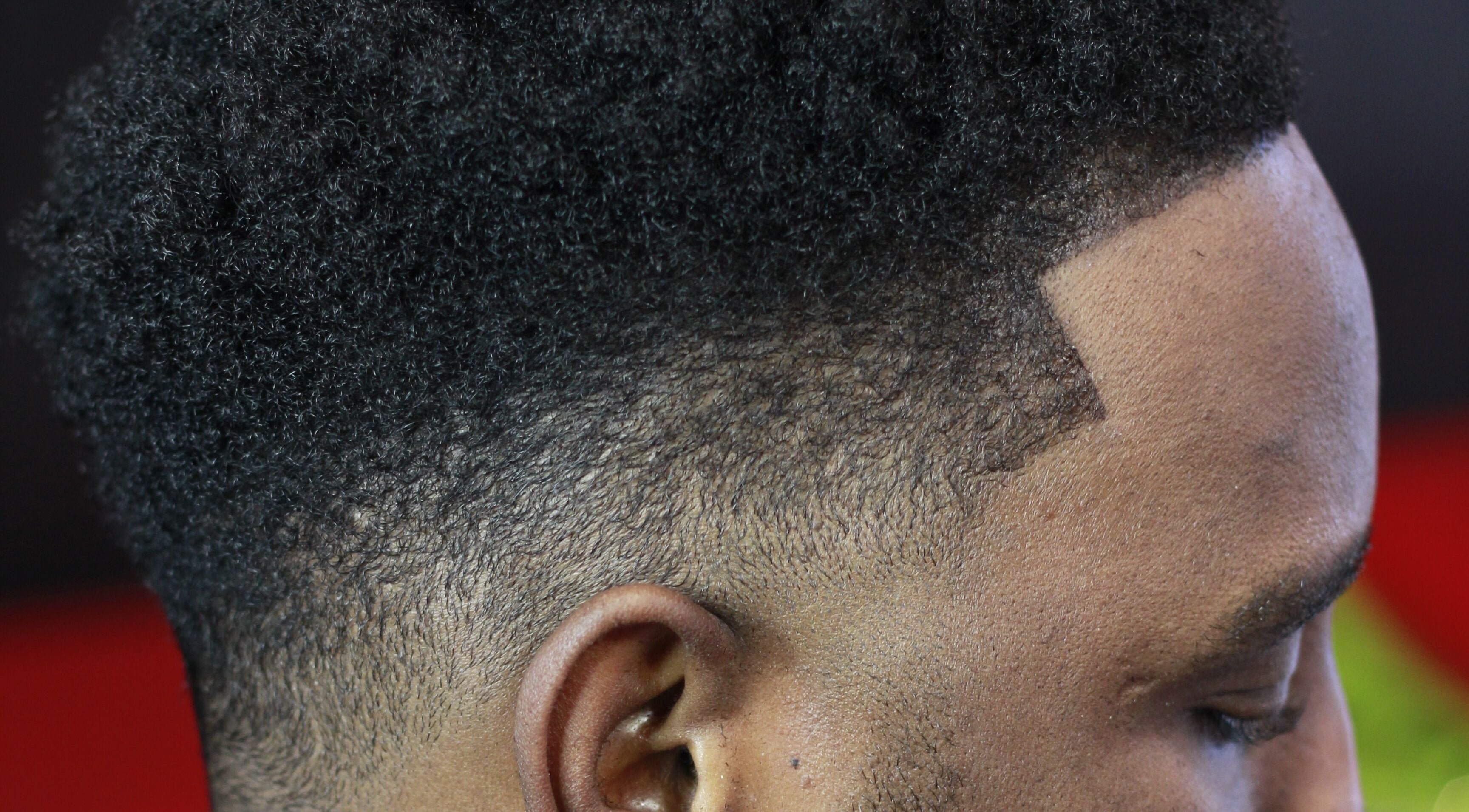 Close-up of a stylish haircut at Rick Blndz in Nassau, New Providence, BS highlighting a clean fade.